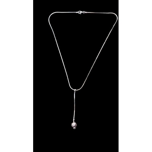 261 - A DESIGNER SILVER DROP BALL NECKLACE