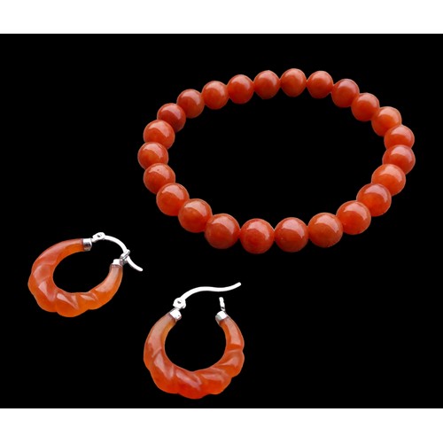 283 - A SET OF 925 SILVER AND RED JADE BRACELET AND EARRING SET