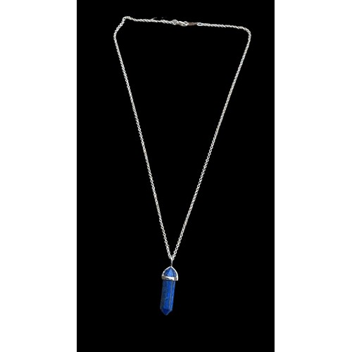 296 - A SILVER AND BLUE LAPIS PENDANT ON SILVER CHAIN