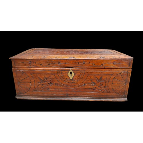 303 - A HEAVILY CARVED OAK BOX 14.5X7X5.5