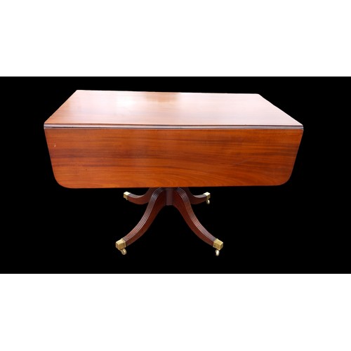 381 - A GEORGIAN MAHOGANY PEMBROKE TABLE ON BRASS CUP CASTERS