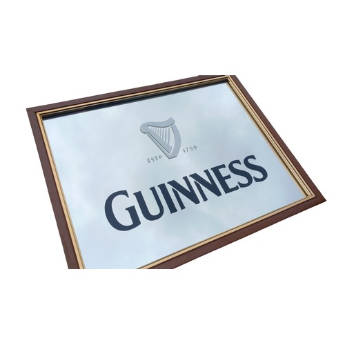 385 - OAK FRAMED GUINNESS MIRROR 24x19