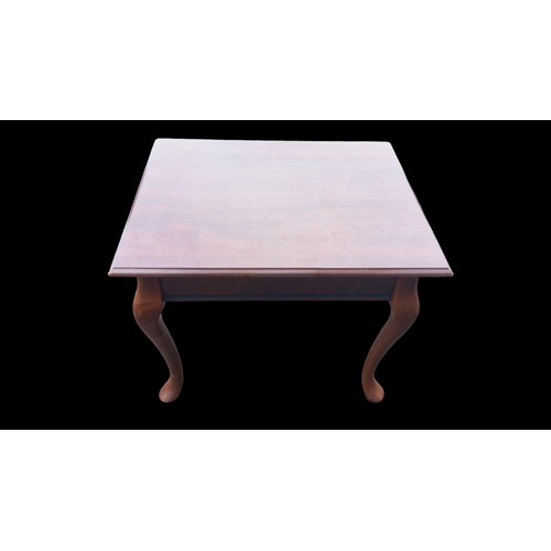 403 - A MAHOGANY CAB LEGGED SIDE TABLE WITH A BRASS HANDLE