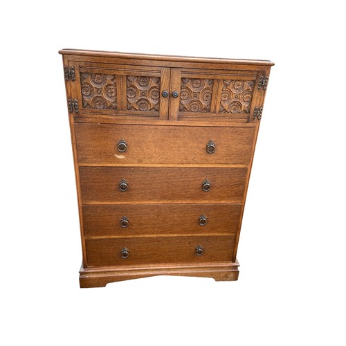 441 - AN ANTIQUE OAK CABINET OVER DRAWERS