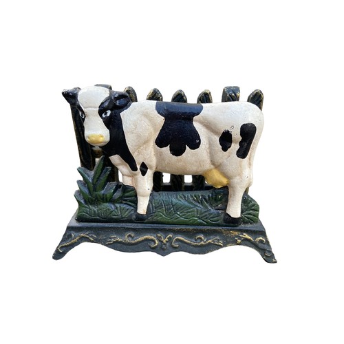 447 - A CAST COW LETTER RACK