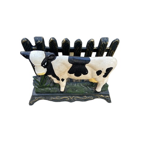 447 - A CAST COW LETTER RACK