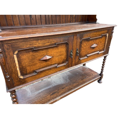 449 - AN ANTIQUE OAK DRESSER WITH BARLEY TWIST