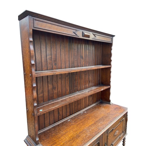 449 - AN ANTIQUE OAK DRESSER WITH BARLEY TWIST