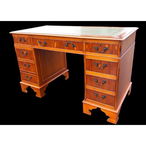 481 - A CHERRY WOOD TWIN PEDESTAL DESK WITH A LEATHER INSET TOP