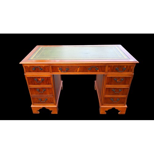 481 - A CHERRY WOOD TWIN PEDESTAL DESK WITH A LEATHER INSET TOP