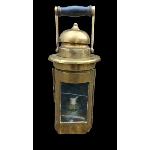 486 - A BRASS SHIPS BINACLE LANTERN ( GLASS CRACKED) 10