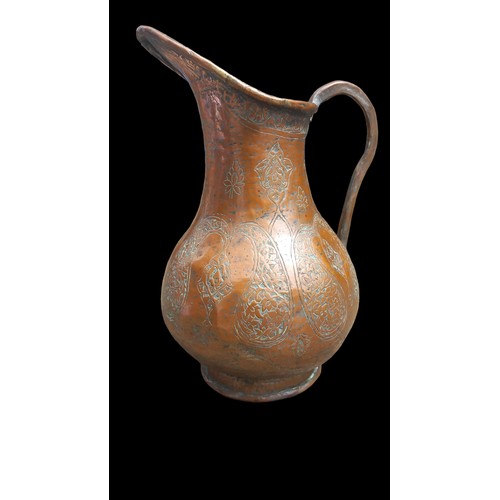 475 - AN ANTIQUE COPPEER JUG 11