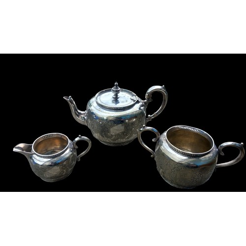 478 - AN ORNATE FLORAL PATTERN 3 PIECE PLATED SERVICE