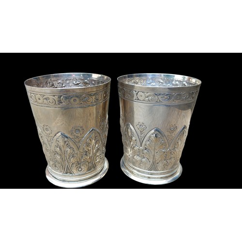 479 - A PAIR OF ORNATE SILVER PLATE CUPS IN A FLORAL PATTERN 5