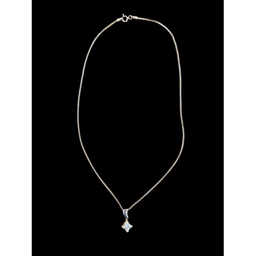 501 - A DESIGNER SHAPED SILVER SOLITAIRE PENDANT ON SILVER CHAIN