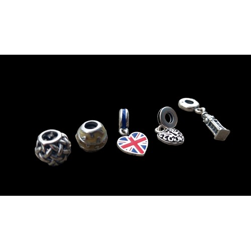 587 - 4 GENUINE SILVER PANDORA CHARMS