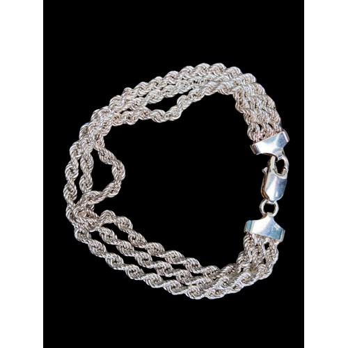 532 - A SILVER TRIPLE ROPE BRACELET