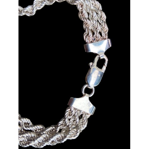 532 - A SILVER TRIPLE ROPE BRACELET