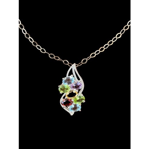 534 - A MULTI GEM SET SILVER DESIGNER PENDANT ON SILVER CHAIN