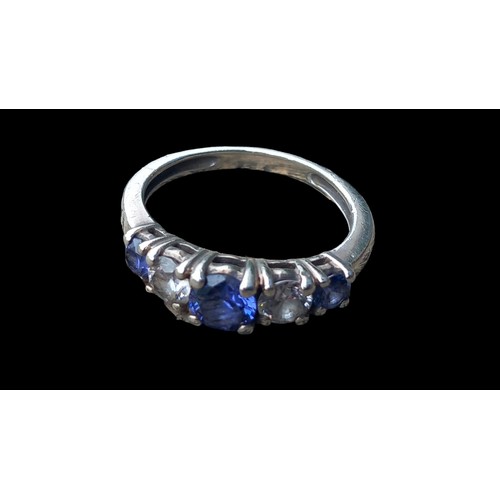 548 - A BEAUTIFUL QUALITY CZ AND TANZANITE RING