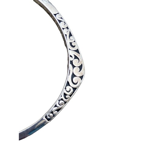 551 - A HEAVY SILVER CELTIC BANGLE WEIGHS 26G