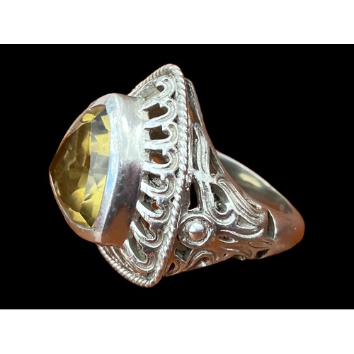 565 - AN AMAZING  LARGE SILVER DESIGNER RING SET WITH A LARGE CITRINE STYLE STONE