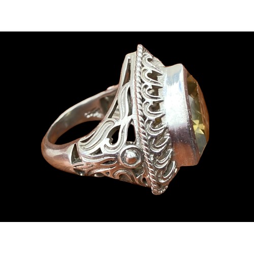 565 - AN AMAZING  LARGE SILVER DESIGNER RING SET WITH A LARGE CITRINE STYLE STONE