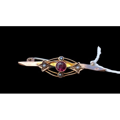 596 - A 9ct GOLD BROOCH SET WITH A RUBY AND SEED PEARLS