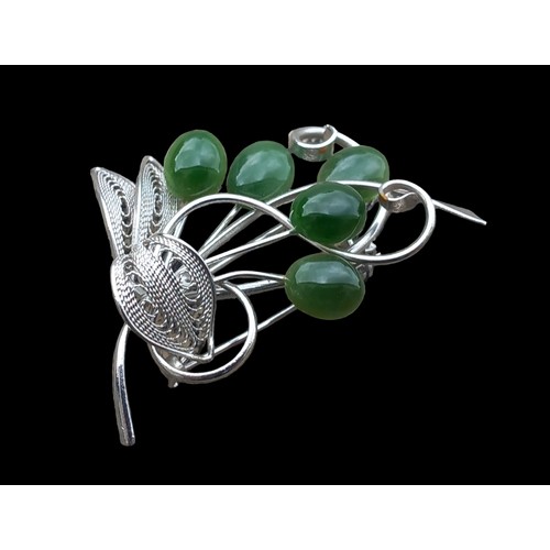 612 - A SILVER  FILAGREE AND JADE BROOCH