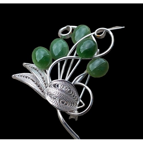 612 - A SILVER  FILAGREE AND JADE BROOCH