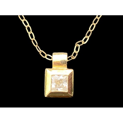 625 - A 9ct GOLD PENDANT SET WITH SQUARE CUT STONE ON A 9ct CHAIN