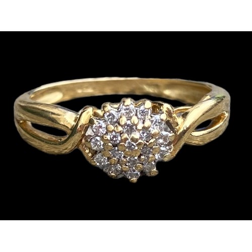 644 - AN 18CT GOLD DESINGER DIAMOND RING