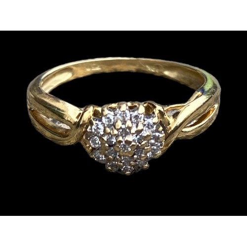 644 - AN 18CT GOLD DESINGER DIAMOND RING