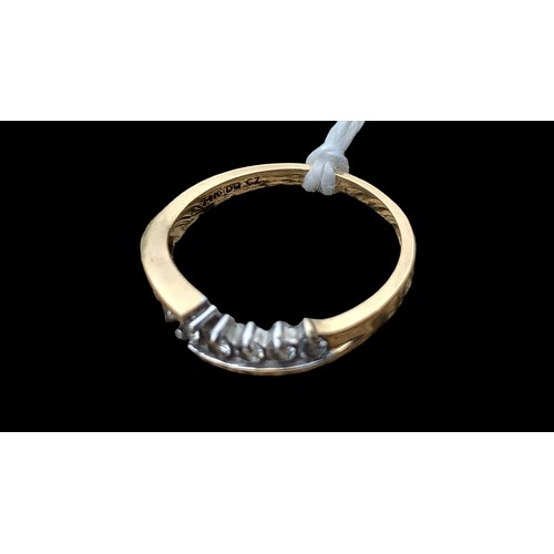 662 - A 14ct GOLD RING SET WIH CZ AND SIZE K