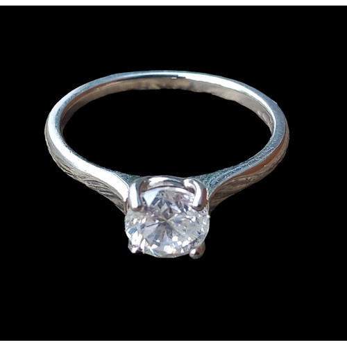 668 - A BEAUTIFUL PLATINUM DIAMOND SOLITAIRE RING (0.75ct) SIZE P