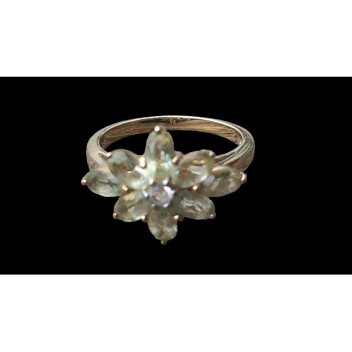 667 - 9ct FLORAL DESIGN RING SET WITH PALE CITREN & WHITE TOPAZ