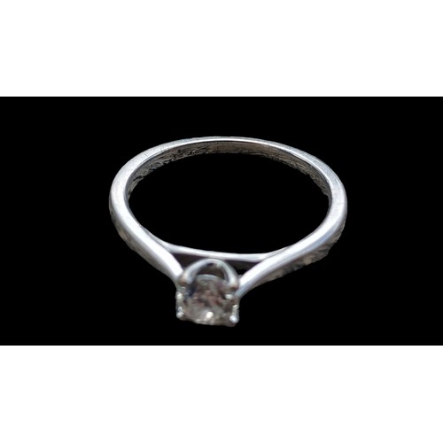 664 - AN 18CT WHITE GOLD SOLITAIRE RING SIZE R