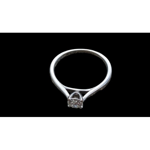 664 - AN 18CT WHITE GOLD SOLITAIRE RING SIZE R