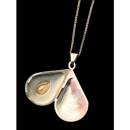 672 - A 9ct GOLD CHAIN WITH A STUNNING SHAPED 9ct LOCKET SET WITH WHITE STONE GOLD 2.17G