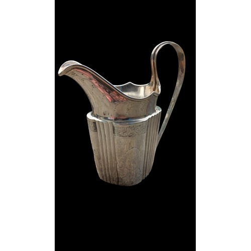 673 - AN 18c CORK PROVINCIAL SILVER JUG