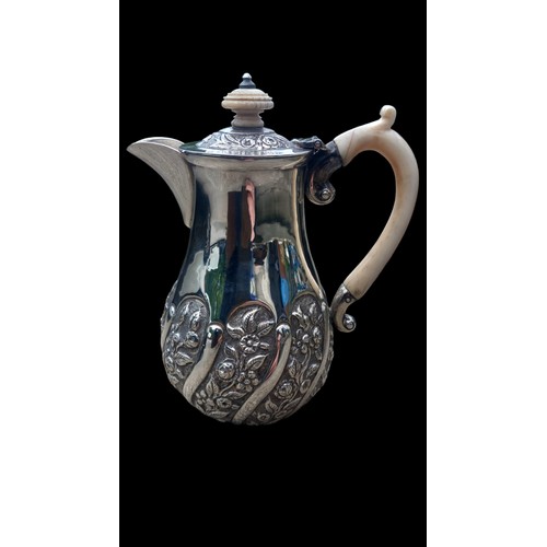 679 - A STUNNING LONDON 1894 SILVER  JUG WITH BONE HANDLE EMBOSSED WITH FLOWERS TOTAL WEIGHT 250grm