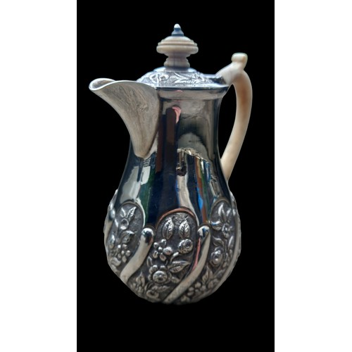 679 - A STUNNING LONDON 1894 SILVER  JUG WITH BONE HANDLE EMBOSSED WITH FLOWERS TOTAL WEIGHT 250grm