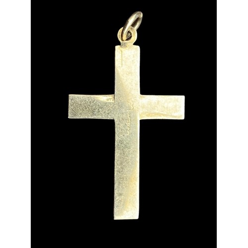 658 - AN ORNATE 9CT GOLD CROSS