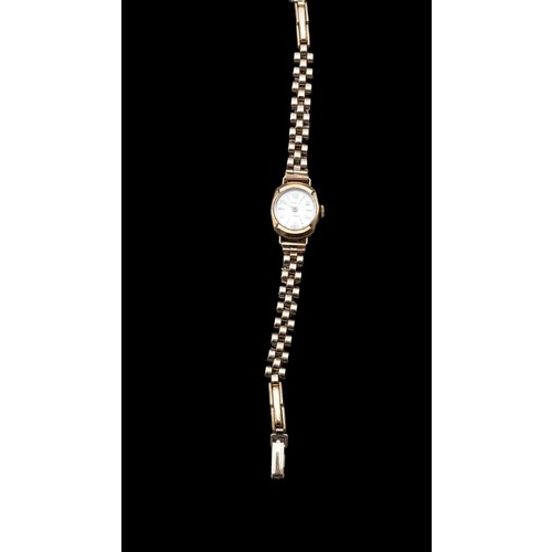 601 - A 9CT GOLD WATCH ON A 10th 12ct ROLLED GOLD STRAP