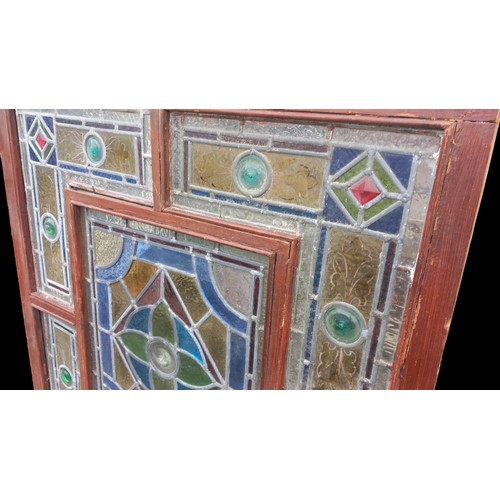 710 - AN ANTIQUE STAINED GLASS WINDOW 33x37