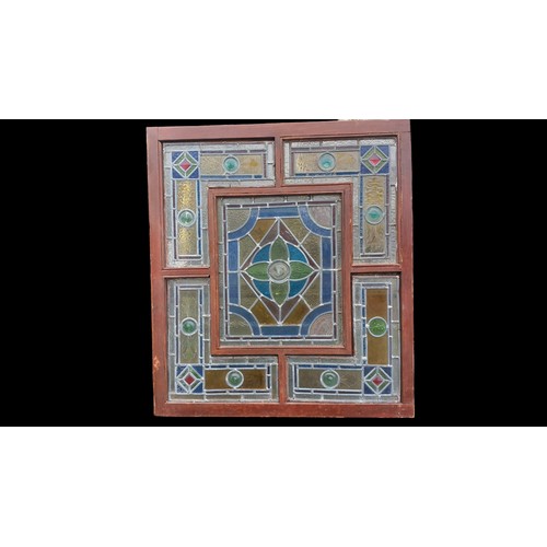 710 - AN ANTIQUE STAINED GLASS WINDOW 33x37