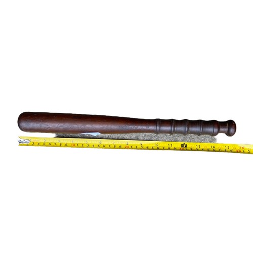 575 - AN OLD POLICE (PROBABLY R.U.C) TRUNCHEON IN MAHOGANY 15”