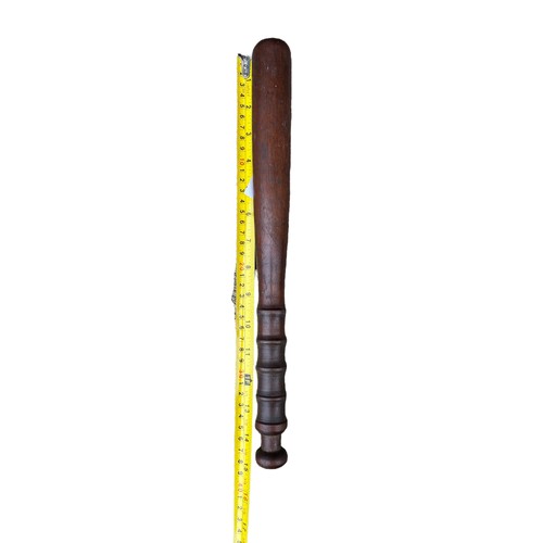 575 - AN OLD POLICE (PROBABLY R.U.C) TRUNCHEON IN MAHOGANY 15”