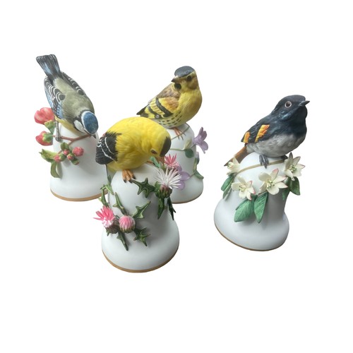 705A - A SET OF 4 LIMITED EDITION FRANKLIN MINT PORCELAIN BIRD BELLS