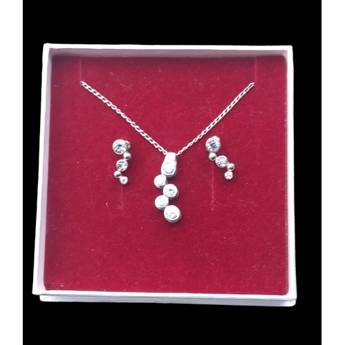 766 - A SILVER NECKLACE AND EARRING SET